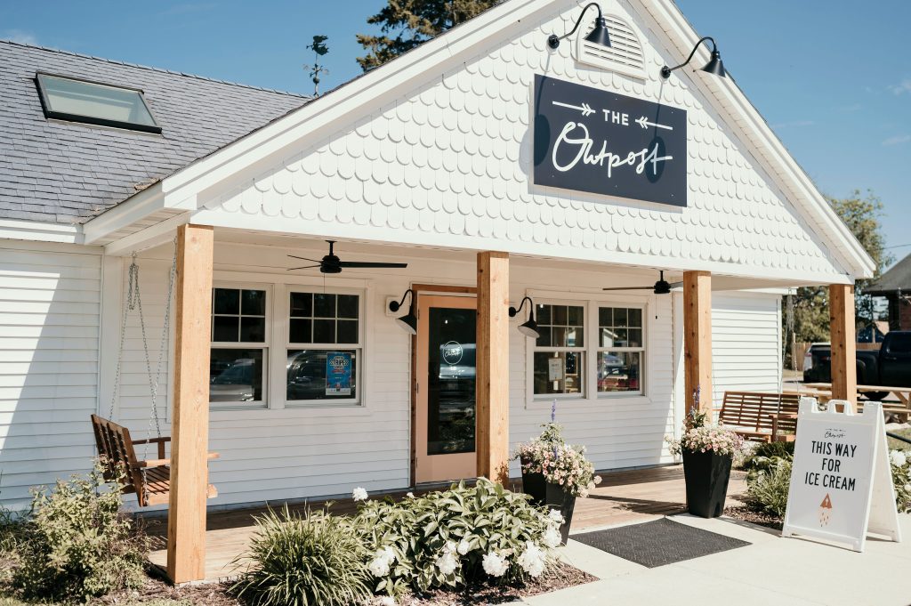The Outpost ice cream shop patio and entrance near the Paul Bunyan Trail in Pequot Lakes